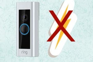 A hardwired Ring video doorbell with an x next to it.