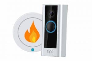 A Ring Alarm doorbell with a small fire on it.