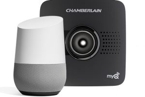 A 2021 Google Home speaker next to a Chamberlain speaker.